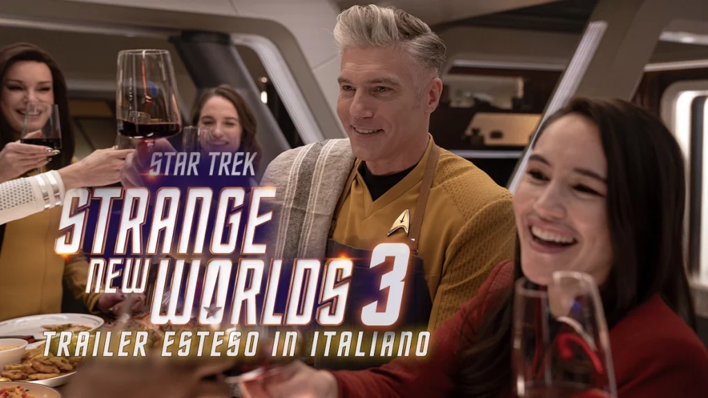 Schermata promozionale del trailer di Star Trek: Strange New Worlds 3 con il Capitano Pike che brinda con bicchieri di vino e il testo "Trailer esteso in italiano".