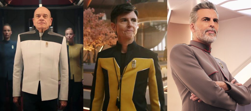 Collage di tre personaggi di Star Trek: a sinistra Robert Picardo come il Dottore in uniforme bianca, al centro Tig Notaro come Jett Reno in uniforme gialla e nera, a destra Oded Fehr come Ammiraglio Vance in uniforme marrone chiaro.