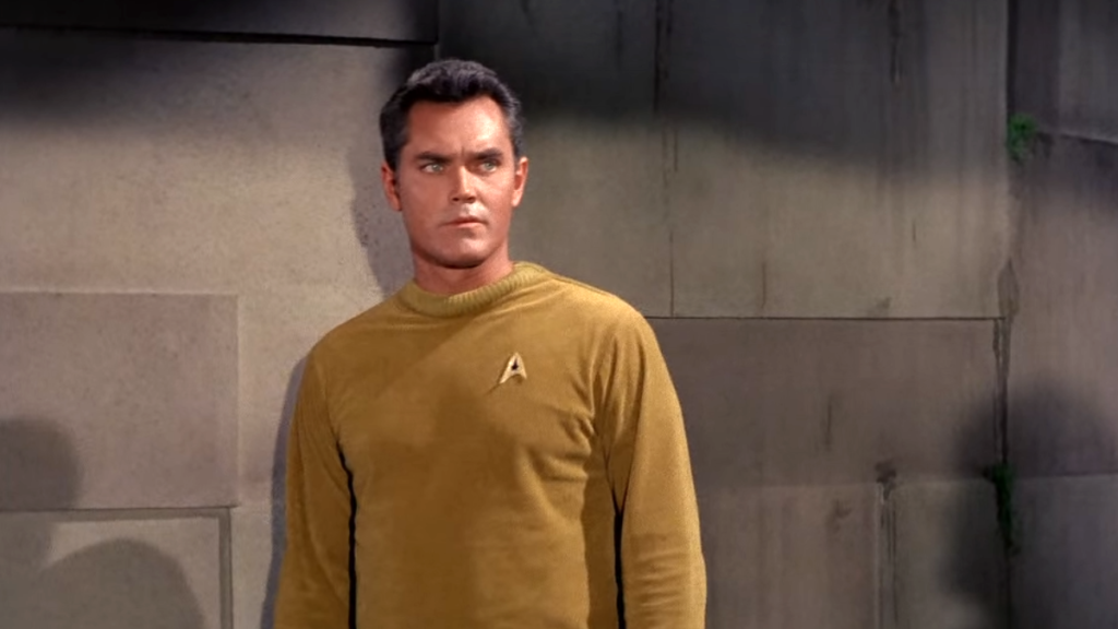 Jeffrey Hunter nel ruolo di Pike nell'episodio primo episodio Pilota "The Cage - Lo Zoo di Talos"